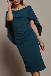 Model Amanda wearing size 10 of the Cora Dress in colour Darkteal (Green), from the front, cropped image