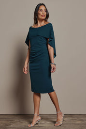 Model Amanda wearing size 10 of the Cora Dress in colour Darkteal (Green), from the front, showing the whole outfit