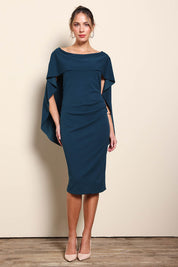 Model Maddiec wearing size 10 of the Cora Dress - Darkteal in colour Darkteal, from the front