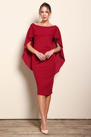 Model Maddiec wearing size 10 of the Cora Dress – Garnet in colour Garnet, from the front