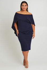 Model Ashleigh wearing size 16 of the Cora Dress in colour Navy (Blue), from the front, showing the whole outfit