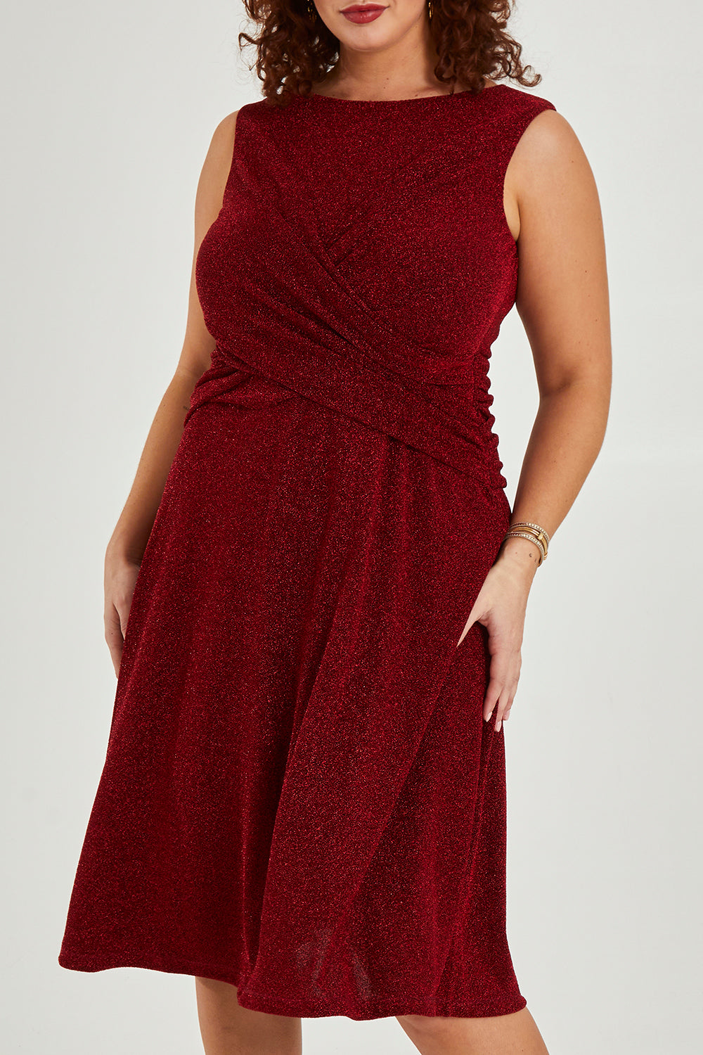 Model Maddy wearing size 16 of the Alex Dress in colour Flame (Red), from the front, cropped image