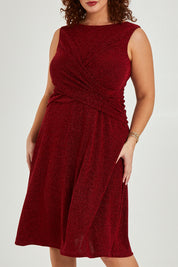 Model Maddy wearing size 16 of the Alex Dress in colour Flame (Red), from the front, cropped image