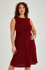 Model Maddy wearing size 16 of the Alex Dress in colour Flame (Red), from the front, cropped image