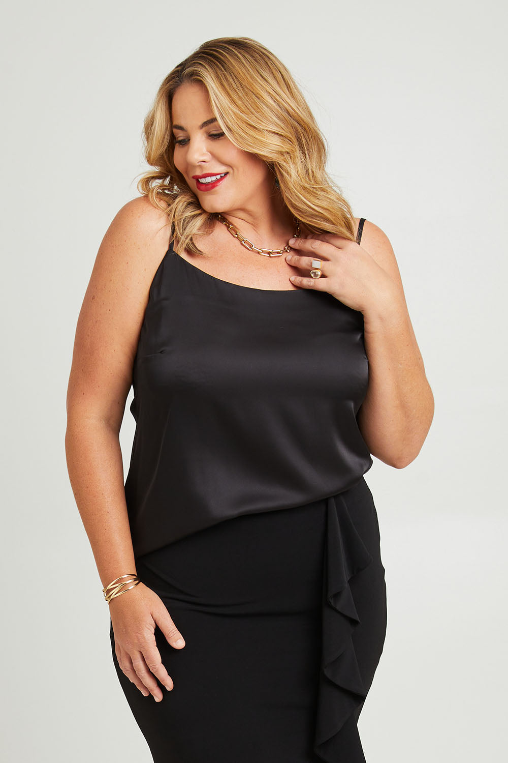 Model Fiona wearing size 16 of the Charlie Camisole in colour Black (Black), from the front, cropped image
