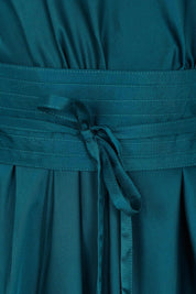 Product shot of the Hayley Dress in colour Ocean (Green), detail