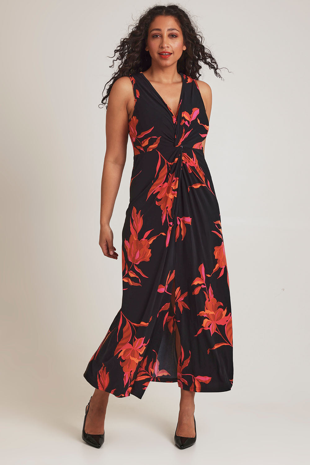 Model Terri-Leigh wearing size 14 of the Frankie Dress in colour Firelight (Black), from the front, showing the whole outfit