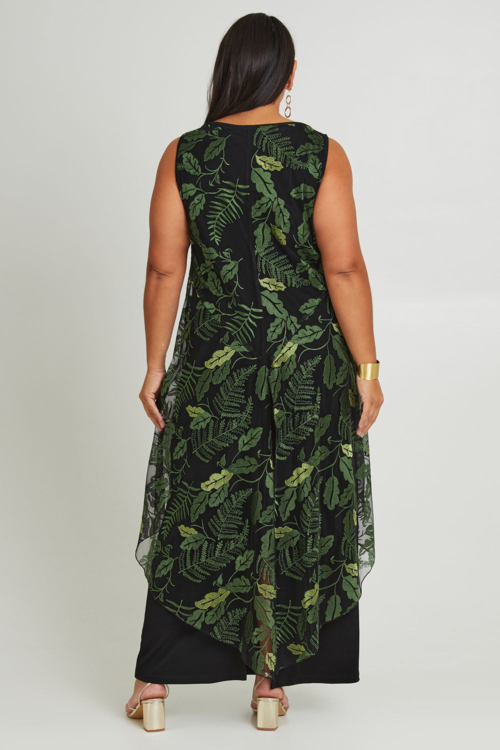 Model Ashleigh wearing size 16 of the Mariela Dress Set in colour Blkforest (Black), from the back