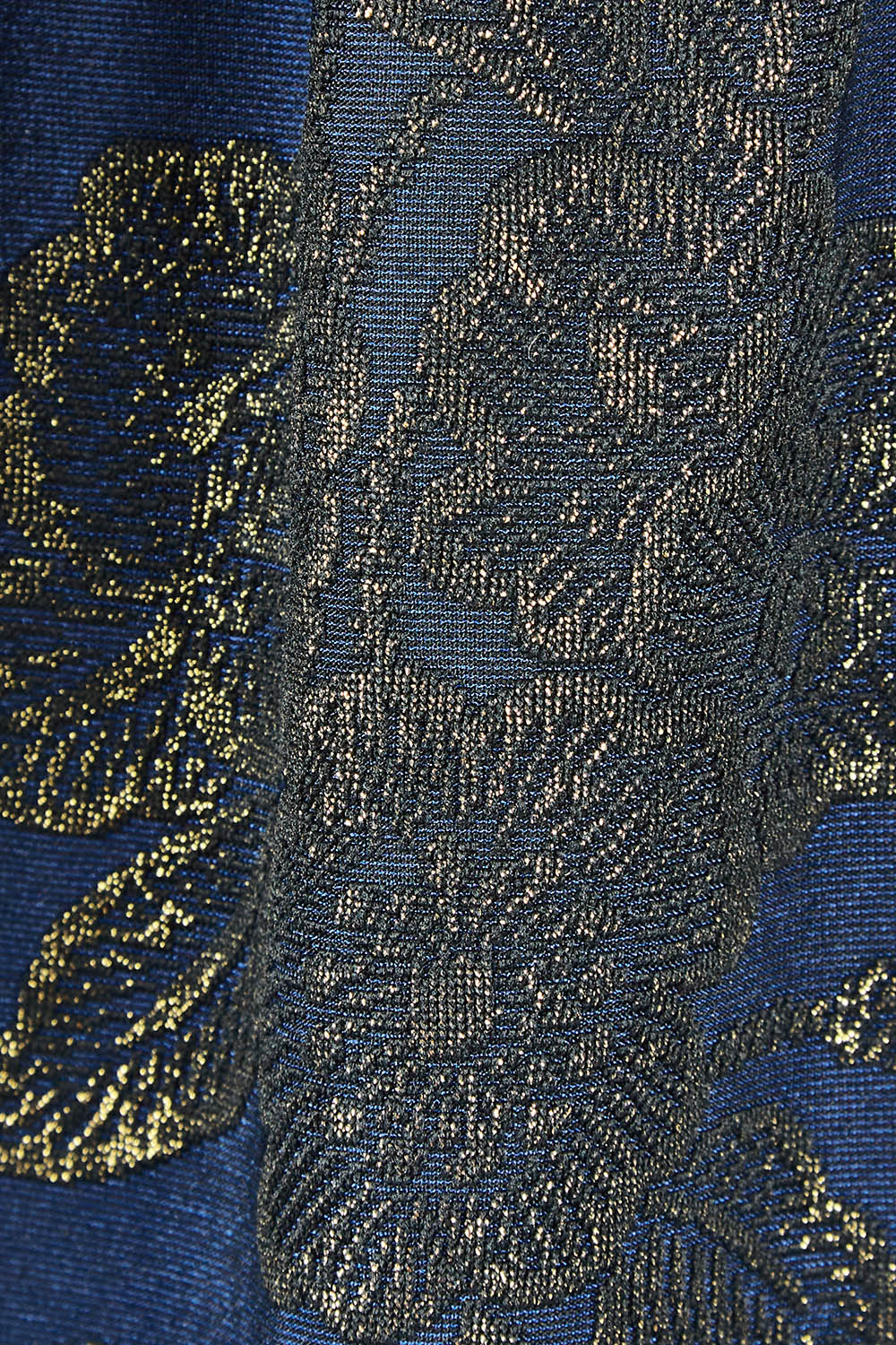Product shot of the Cara Top in colour Navygold (Blue), detail