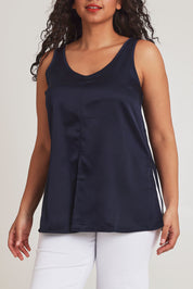 Model Terri-Leigh wearing size 14 of the Cindy Top in colour Navy (Blue), from the front, cropped image
