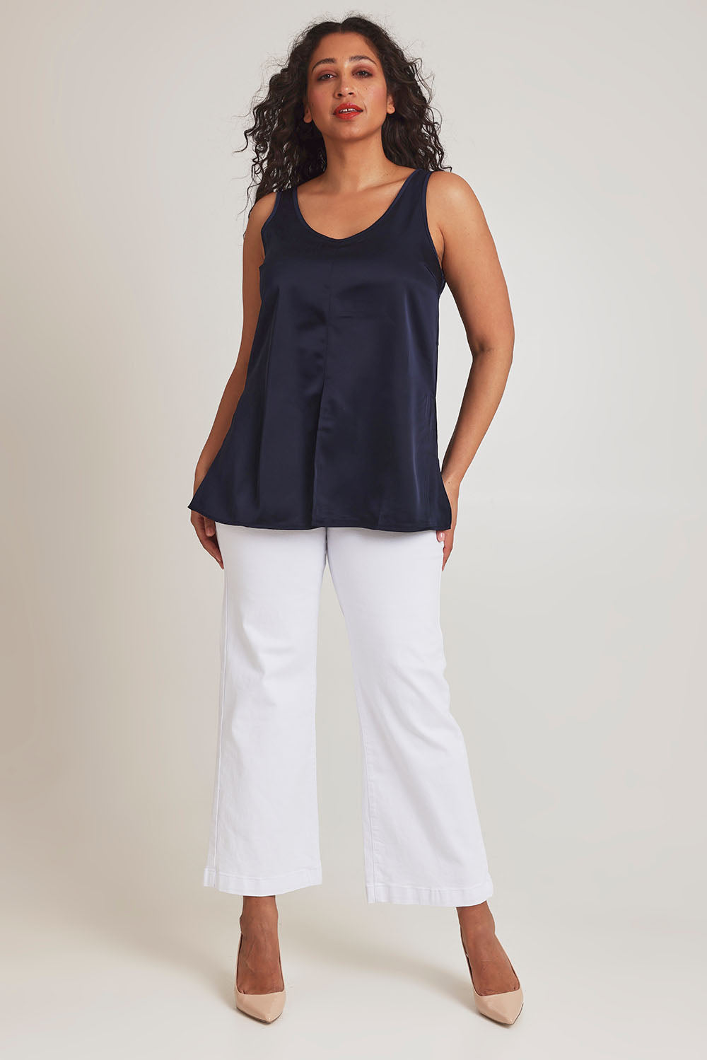 Model Terri-Leigh wearing size 14 of the Cindy Top in colour Navy (Blue), from the front, showing the whole outfit