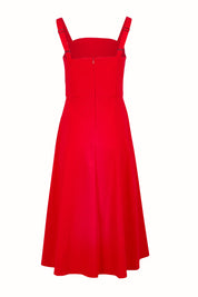 Product shot of the Carmen Dress in colour Flame (Red), from the back