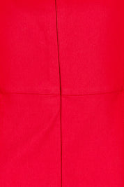 Product shot of the Carmen Dress in colour Flame (Red), detail