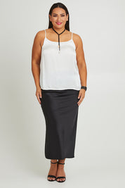 Model Ashleigh wearing size 16 of the Clarice Camisole in colour Snow (White), from the front, showing the whole outfit