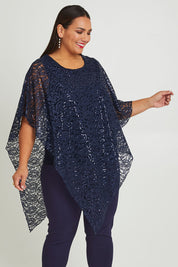 Model Ashleigh wearing size 16 of the Ann Marie Top in colour Navy (Blue), from the front, cropped image