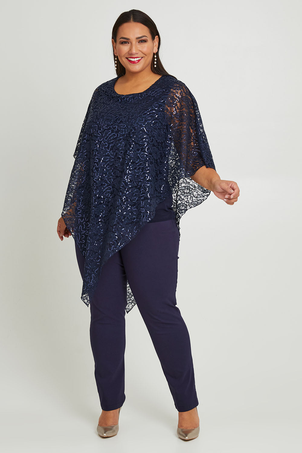 Model Ashleigh wearing size 16 of the Ann Marie Top in colour Navy (Blue), from the front, showing the whole outfit