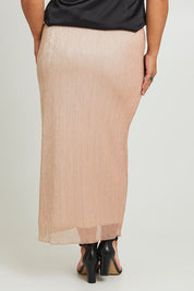 Model Ashleigh wearing size 16 of the Sherri Skirt in colour Amber (Metallics), from the back