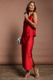 Model Amanda wearing size 10 of the Loulou Satin Skirt in colour Red (Red), from the front, showing the whole outfit