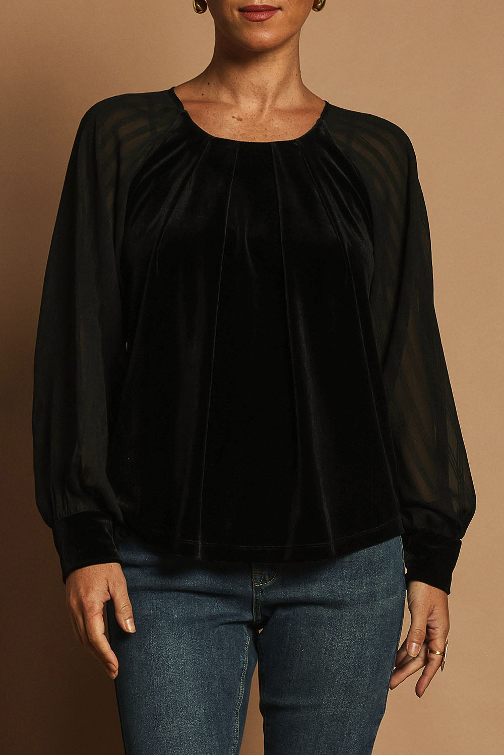 Model Katie wearing size 10 of the Leyla Velvet Blouse in colour Black (Black), from the front, cropped image