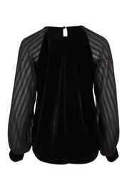 Product shot of the Leyla Velvet Blouse in colour Black (Black), from the back