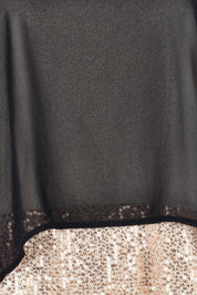 Product shot of the Ria Top in colour Blackgold (Black), detail
