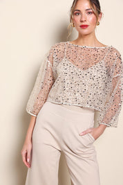 Model Maddiec wearing size 10 of the Petite Nina Sequin Top – Gold in colour Gold, in a cropped view