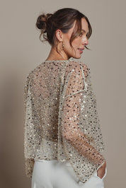 Model Madeline wearing size S of the Nina Sequin Top in colour Gold (Metallics), from the back
