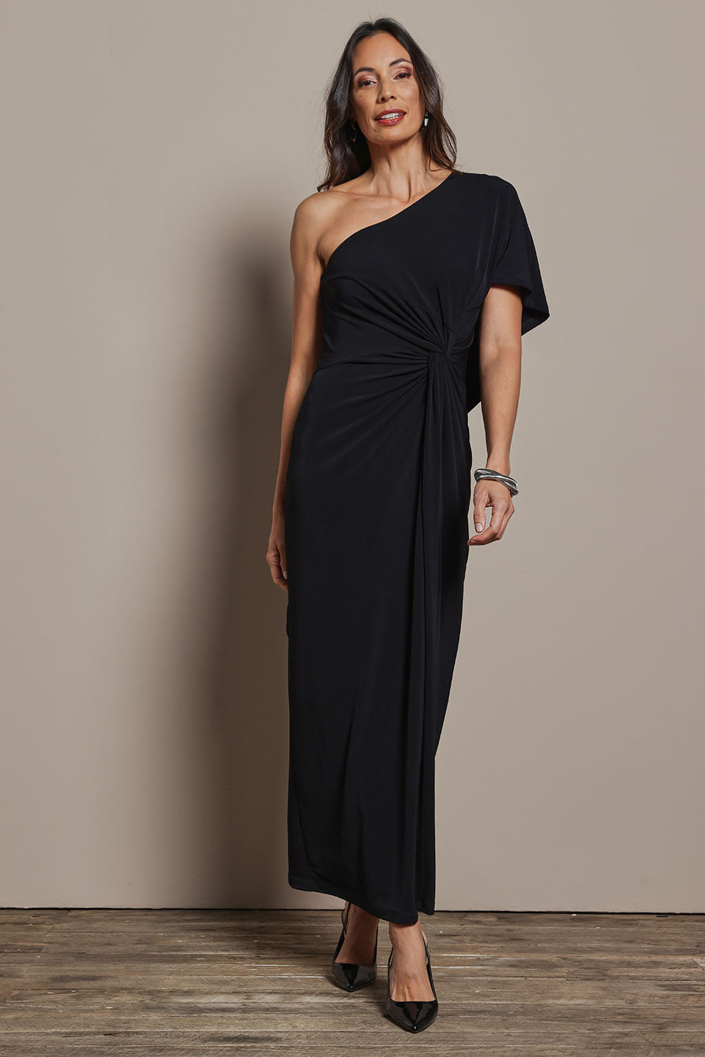 Model Amanda wearing size 10 of the Vanessa Evening Gown in colour Black (Black), from the front, showing the whole outfit