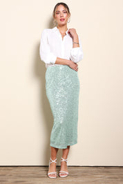 Model Maddiec wearing size 10 of the Reegan Sequin Skirt – Mint in colour Mint, from the front