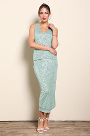 Model Maddiec wearing size 10 of the Reegan Sequin Skirt – Mint in colour Mint, from the front