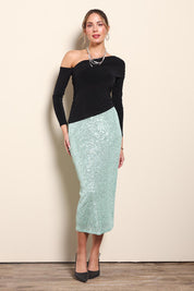 Model Maddiec wearing size 10 of the Reegan Sequin Skirt – Mint in colour Mint, from the front