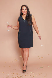 Model Ashleigh wearing size 14 of the Meave Tuxedo Dress in colour Black (Black), from the front, showing the whole outfit