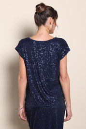 Model Maddiec wearing size 10 of the Reegan Sequin Top – Navy in colour Navy, from the back