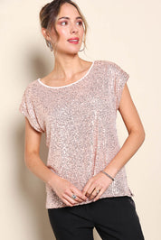 Model Maddiec wearing size 10 of the Reegan Sequin Top - Rosegold in colour Rosegold, from an angle