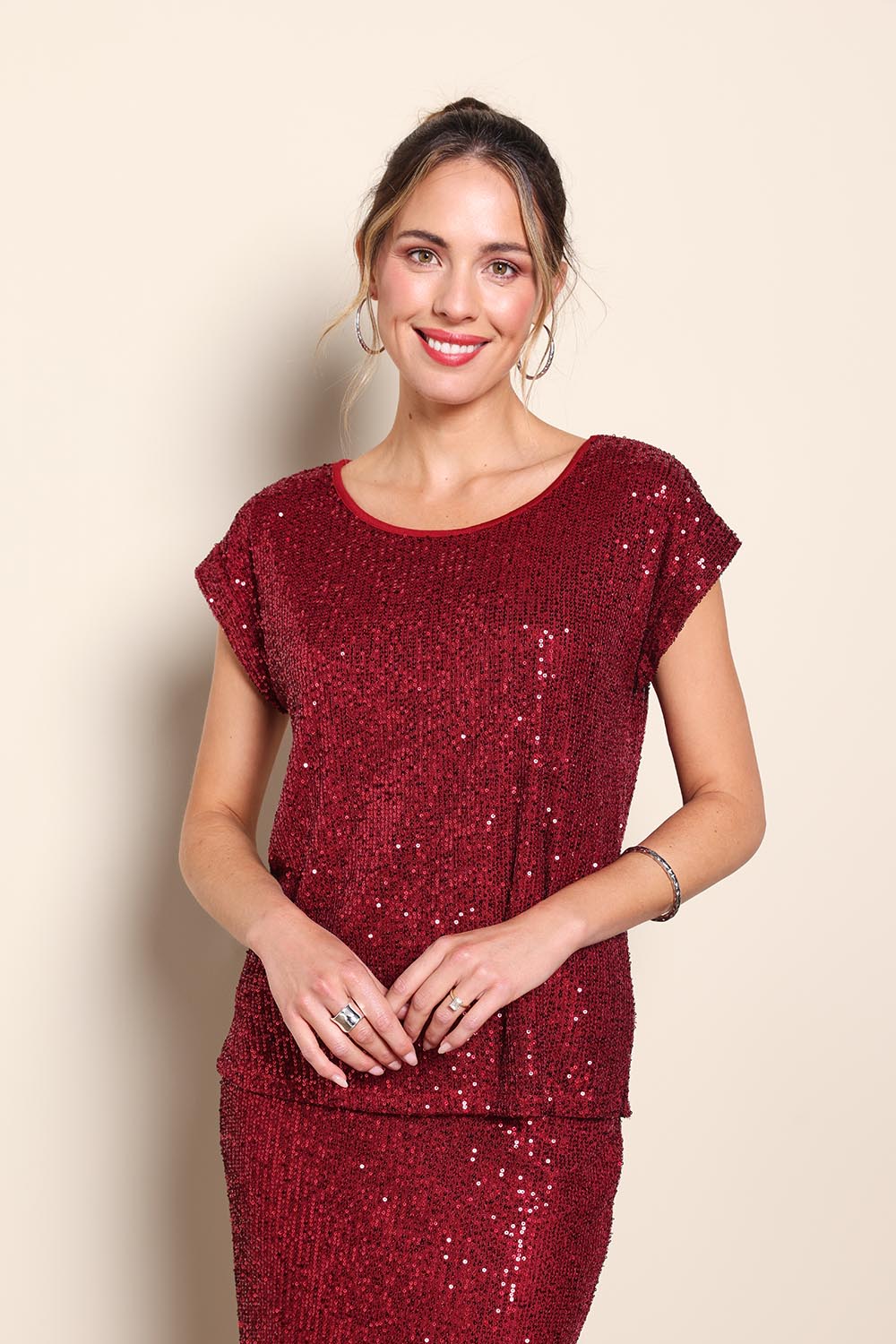 Model Maddiec wearing size 10 of the Reegan Sequin Top - Rouge in colour Rouge, in a cropped view