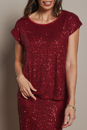 Model Madeline wearing size 10 of the Reegan Sequin Top in colour Rouge (Metallics), from the front, cropped image