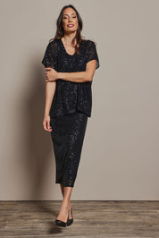 Model Amanda wearing size 10 of the Renee Sequin Top in colour Black (Metallics), from the front, showing the whole outfit