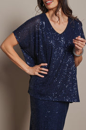 Model Amanda wearing size 10 of the Renee Sequin Top in colour Navy (Metallics), from the front, cropped image