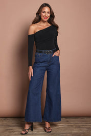 Model Madeline wearing size 10 of the Lucy Top in colour Black (Black), from the front, showing the whole outfit
