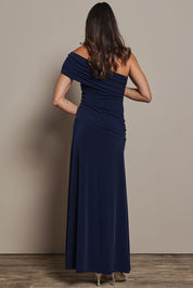 Model Amanda wearing size 10 of the Lucy Dress in colour Navy (Blue), from the back
