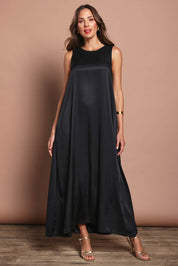 Model Madeline wearing size 10 of the Linda Dress in colour Black (Black), from the front, showing the whole outfit