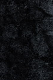 Product shot of the Daphne Faux Fur Cape in colour Black (Black), detail