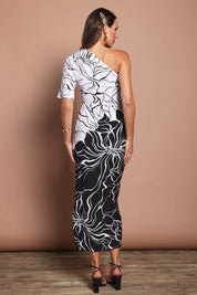 Model Madeline wearing size 10 of the Racquel Dress in colour Blackwhite (Black), from the back