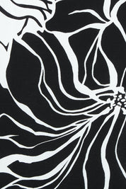 Product shot of the Racquel Dress in colour Blackwhite (Black), detail