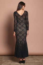 Model Madeline wearing size 10 of the Claire Lace Dress in colour Black (Black), from the back