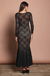 Model Madeline wearing size 10 of the Claire Lace Dress in colour Black (Black), from the back