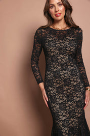 Model Madeline wearing size 10 of the Claire Lace Dress in colour Black (Black), from the front, cropped image