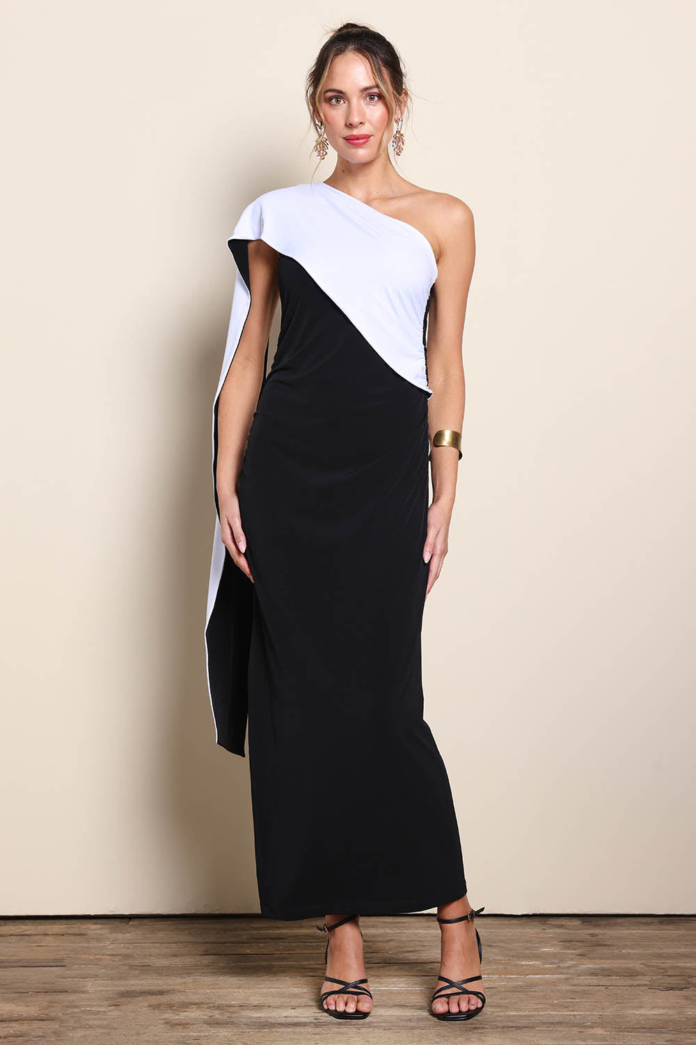 Model Maddiec wearing size 10 of the Camille Reversable Dress – Black in colour Black, from the front