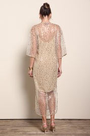 Model Maddiec wearing size 10 of the Nina Sequindress – Gold in colour Gold, from the front