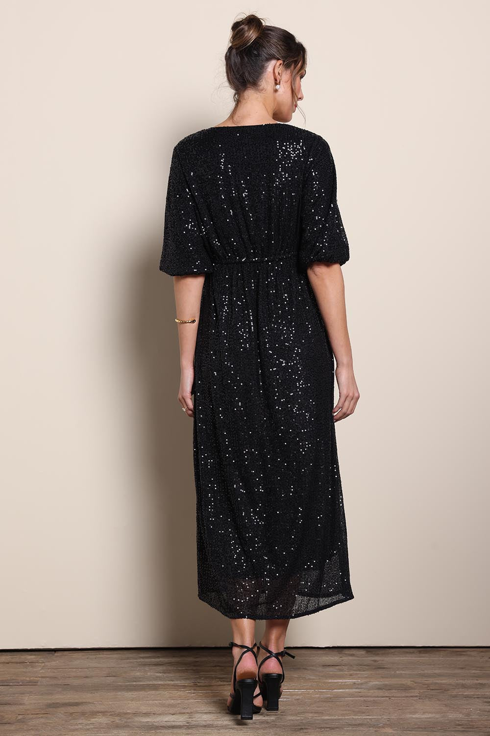 Model Maddiec wearing size 10 of the Priscilla Evening Gown – Black in colour Black, from the front